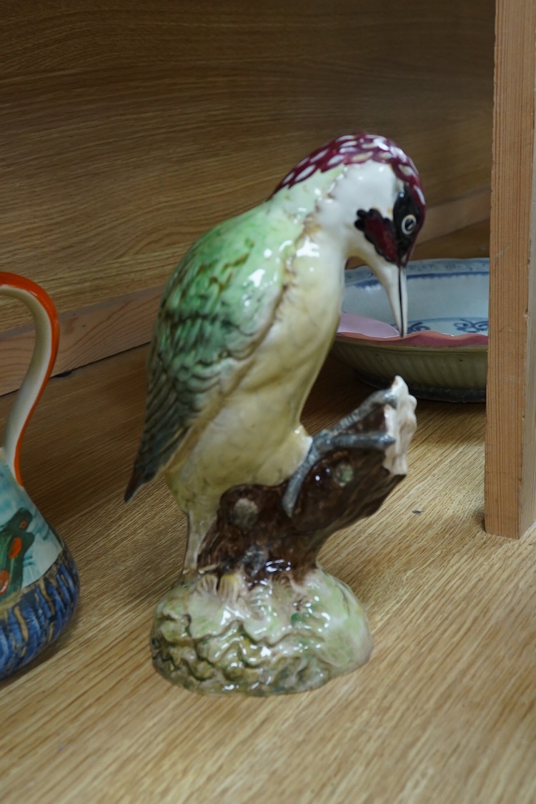 A Beswick woodpecker, two Myott jugs and two Wedgwood teapots and covers, largest 22cm